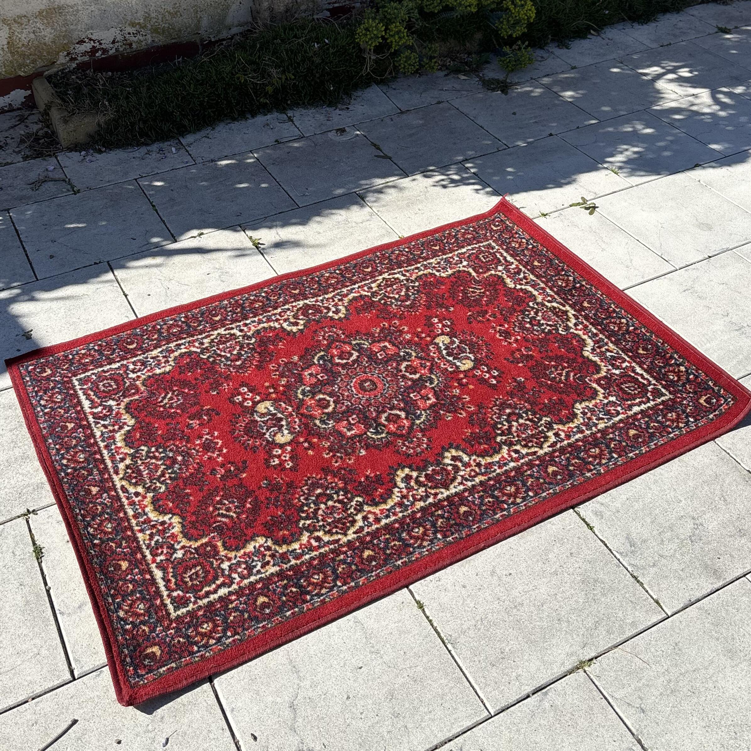 Tapis ancien à motifs