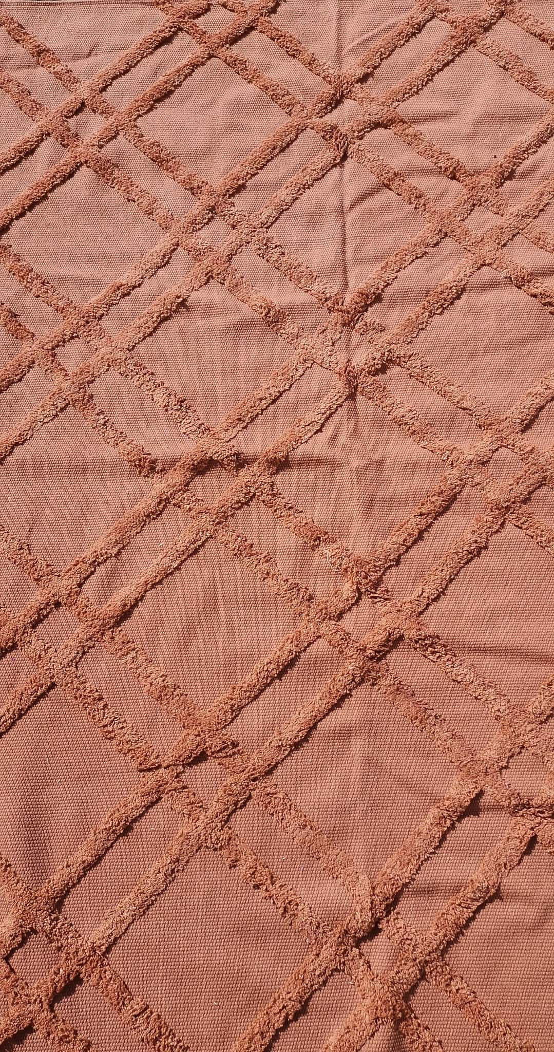Tapis tissus terracota